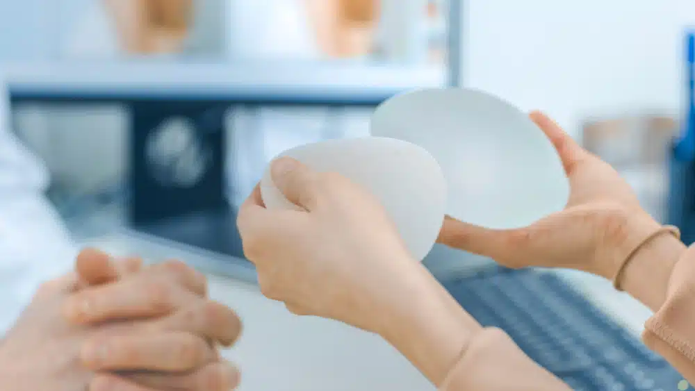 Silicone gel implants offer a natural look and feel, mimicking breast tissue, while saline implants provide versatility.