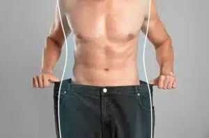 Side profile showing reduction of male side fat post-liposuction
